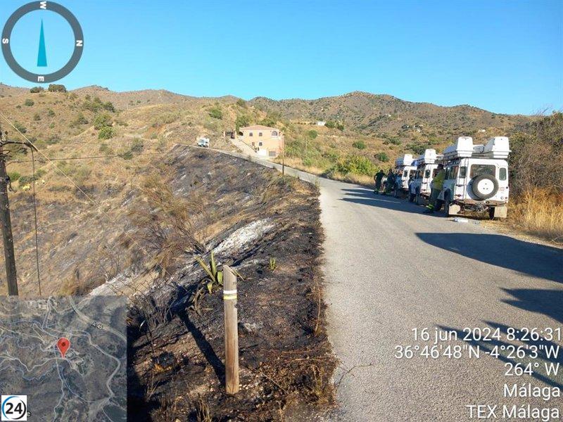 La MA-3101 cortada por incendio cerca del Pantano de Málaga, ya controlado.
